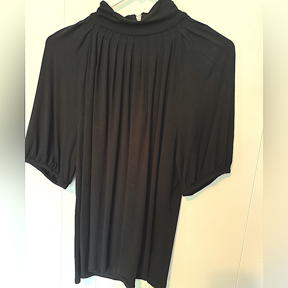 Black mock neck blouse by Michael Kors with silver back zipper